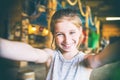 Joyful little girl making selfie Royalty Free Stock Photo