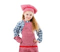 Joyful little girl in red apron isolated on white background Royalty Free Stock Photo