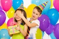 Joyful little kid girl receiving gifts at birthday Royalty Free Stock Photo