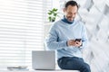 Joyful manager having a break in the office Royalty Free Stock Photo