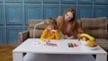 Joyful mother babysitter teacher helping kid daughter with homework, learning writing at home Royalty Free Stock Photo