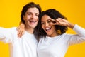 Joyful Multiracial Couple Taking Selfie, Afro Girl Showing Peace Sign