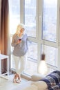 Joyful nice woman looking over the city Royalty Free Stock Photo