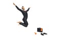 Barefoot toy miniature businessman figurine is jumping for joy and happiness, with colourful socks, shoes and briefcase, concept i