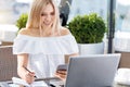 Joyful positive woman taking notes Royalty Free Stock Photo