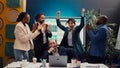 Joyful proud employees celebrating their business success finding out results Royalty Free Stock Photo