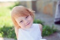 Joyful red-haired girl smiling