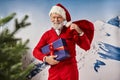 joyful Santa in red attire smiling