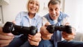 Joyful senior couple playing video games together Royalty Free Stock Photo