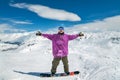 Joyful snowboarder with hands up Royalty Free Stock Photo