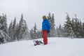 Joyful snowboarder relaxes during freeride in a hard conditions Royalty Free Stock Photo