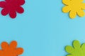 Joyful spring or summer background. multicolored decorative flowers on blue background. Happy Easter holiday concept Royalty Free Stock Photo