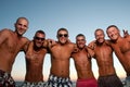Joyful team of friends having fun at the beach Royalty Free Stock Photo