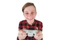 Joyful teen boy playing video games isolated over white background