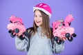 Joyful teen going skating. Sporty teen girl. Girl cute teen wear helmet and roller skates on violet background. Forward