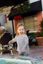 joyful toddler girl in striped long Royalty Free Stock Photo