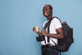 Joyful tourist having DSLR device while being excited for citybreak Royalty Free Stock Photo