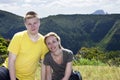 Joyful tourists on a background of mountains and the woods of Mauritius