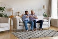 Joyful two male generations bonding family bumping fists. Royalty Free Stock Photo