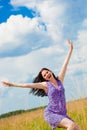 Joyful woman in the field Royalty Free Stock Photo