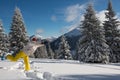 Joyful woman goes on snowshoes and having fun Royalty Free Stock Photo