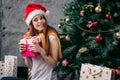 Joyful woman holding favourite gift Royalty Free Stock Photo