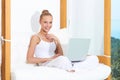 Joyful woman laughing with laptop Royalty Free Stock Photo