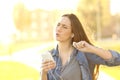 Joyful woman listening music from a smart phone Royalty Free Stock Photo