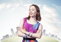 Joyful woman standing with folded arms Royalty Free Stock Photo