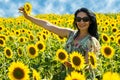 Joyful woman in sunflowers field Royalty Free Stock Photo