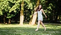 Joyful Woman Walking Barefoot in City Park Royalty Free Stock Photo