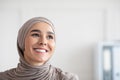 Joyful arab woman in hijab looking at copy space Royalty Free Stock Photo
