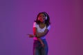 Joyful Young Black Lady In Wireless Headphones Listening Music And Dancing Royalty Free Stock Photo