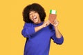 Joyful young black man holding passport and boarding passes