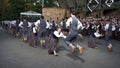 The joyful young dancers\' energetic folk dance performance