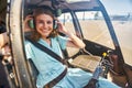 Pleased Caucasian airwoman getting ready for flight Royalty Free Stock Photo