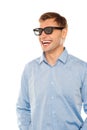 Joyful young man wearing goggles looking away