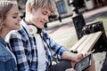 Joyful young people using a tablet