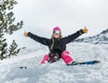 Joyful young woman snowboarder Royalty Free Stock Photo