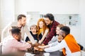 Joyful conneting hands together in the modern office canteen Royalty Free Stock Photo