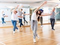 Joyous boy and girls dancing hip hop at lesson in the class Royalty Free Stock Photo