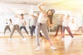 Joyous boy and girls dancing hip hop at lesson in the class Royalty Free Stock Photo