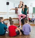 Joyous boys and girls rehearsing ballet dance in studio Royalty Free Stock Photo