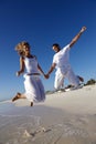 Joyous couple on beach Royalty Free Stock Photo