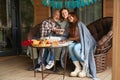 Joyous teen celebrating her birthday with family on terrace Royalty Free Stock Photo