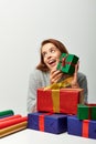 joyous woman in winter sweater near