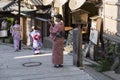 Kyoto Higashiyama street scene with three women in kimono