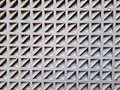 Geometric pattern of white concrete roster wall with triangular shadows Royalty Free Stock Photo