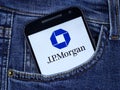 JPMorgan Chase logo seen displayed on smartphone in the pocket of jeans Royalty Free Stock Photo