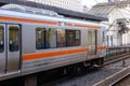 JR train stopping at station in Toyama, Japan